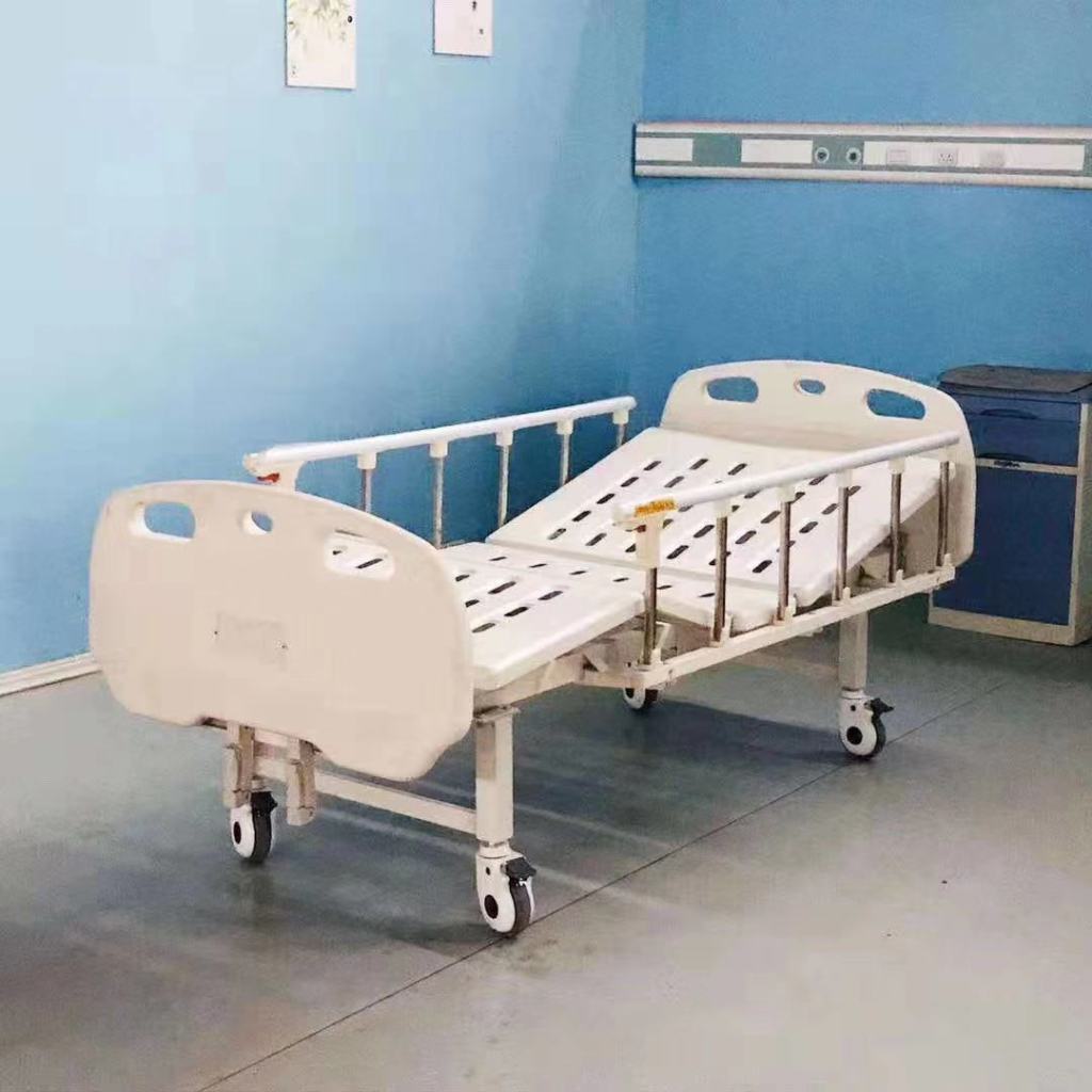 2 cranks manual hospital bed in healthcare center
